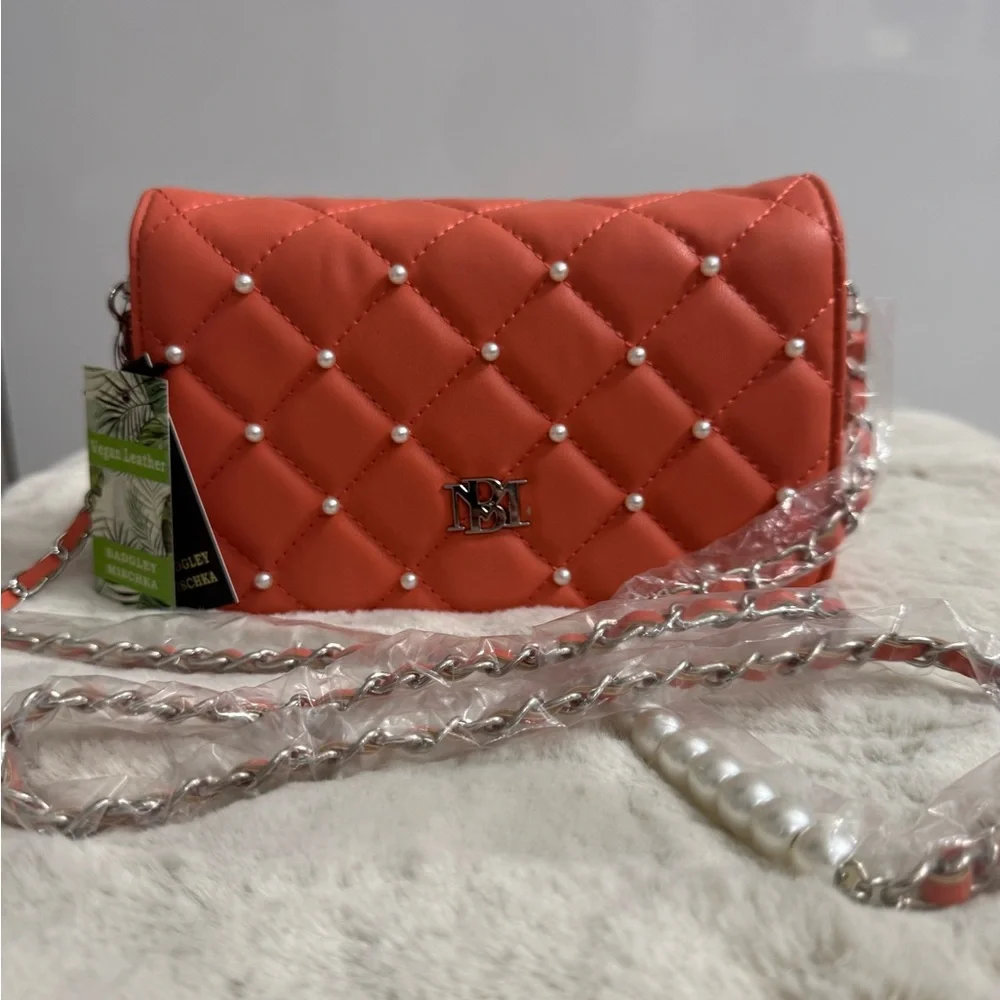 New Badgley Mischka Peach Quilted Crossbody Bag. Small defect see last pic.